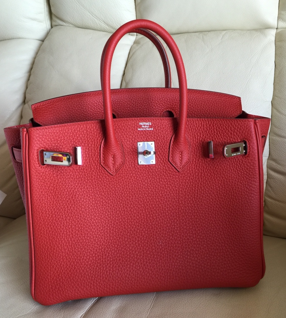 Meet the Rouge Grenat Birkin! This iconic bag is in the color red