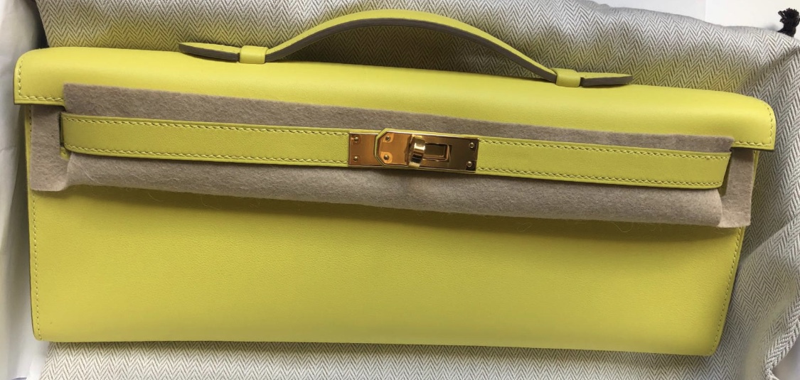 A LIME SWIFT LEATHER KELLY POCHETTE WITH GOLD HARDWARE