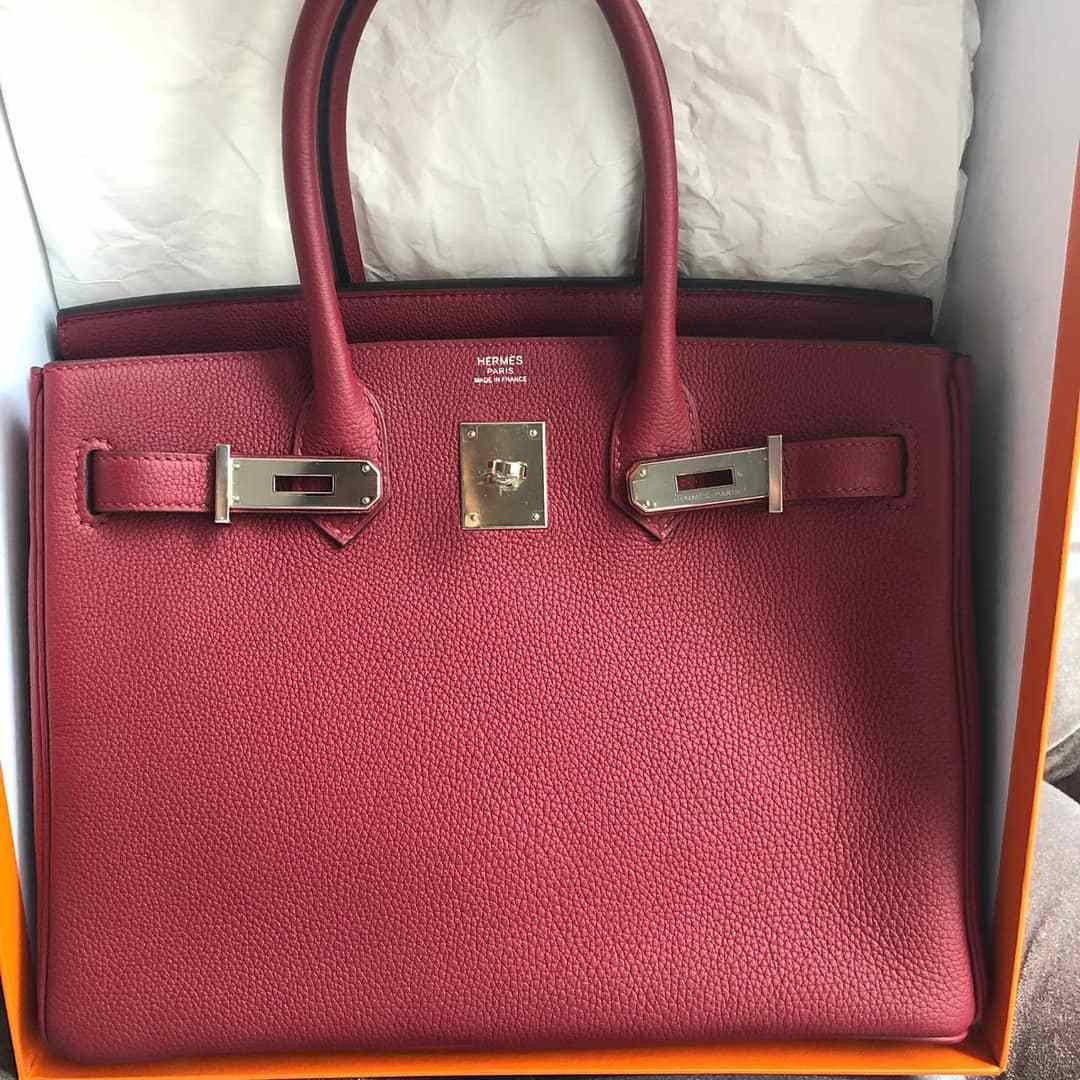 A ROUGE GRENAT TOGO LEATHER EVELYNE TPM WITH PALLADIUM HARDWARE